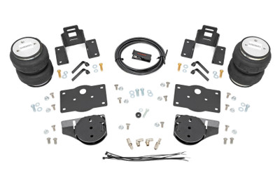 Ideal Leveling. Is your truck your workhorse? The main attraction to the pick-up line is the accessibility to haul and tow as desired. However, due to the amount of weight in the bed, or the condition of the vehicle's rear leaf springs, this can cause the vehicle to be un-level when under load. Here at Rough Country, we created an innovative new product to ensure that these are troubles of the past. Introducing, Rough Country's Rear Air Spring Kit.Heavy-duty Construction. Rough Country's Rear Air Spring Kit features two RC branded high-quality double convoluted airbags complemented with DOT-approved airlines. Whether you plan on towing or hauling in the not-so-distant future Rough Country's Air Spring kit is the must-have accessory to ensure that your trailer is level reducing the weight off of the tongue of your trailer.┬á Each kit offers 1/4" push connector fittings and all of the bracketry needed to ensure installation is lightning fast and secure! Rough Country's Air Spring kit provides up to 5,000 lbs of load support to ensure that you experience less sway and bottoming out when braking and steering!┬á\
Installation. With an estimated timeframe of 1-2 hours this full kit can be installed at home using standard tools and can be completed efficiently and quickly!\
Limited Lifetime Replacement Warranty. Rough Country's Rear Air Spring Kit is backed with a limited-lifetime replacement warranty towards manufacturer defects. As such, the product is protected from structural and workmanship damage after the date of purchase. With our industry-leading warranty give yourself peace of mind when using Rough Country's Suspension products!┬á