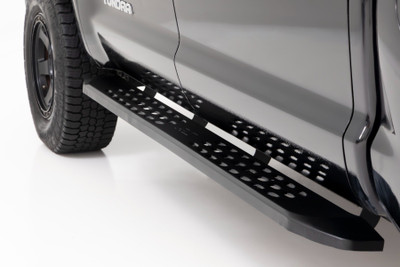 Elevate your style. Add a touch of the wild to your ride with Rough Country's Raptor-inspired running board side steps! Made from durable, rust-resistant steel, they feature a slimmer design that looks great on lifted vehicles. And if that's not enough, we've added dimple die holes for extra traction - ensuring you'll be safe and stable when stepping onto your running boards.Steady and Stylish. Our RPT2 running boards feature a 6.75-inch wide stepping area, perfect for getting in and out of your cab with ease. Plus, they're coated in matte black powder for a sleek, finished look. And if you're worried about safety, don't be! Our non-slip design ensures that you'll stay steady on your feet. Plus, the one-piece steel construction ensures that these steps will last for years to come.Installation. These side steps are a must-have for anyone looking to make their Chevy/GMC stand out from the crowd. With an easy installation that doesn't require any drilling or cutting, these running boards can be installed at home in just 1-2 hours. Transform your truck with Rough Country's RPT2 Running Board Side Steps.Warranty. Rough Country's Running Board Side Steps are backed with a five-year replacement warranty towards manufacturer defects. As such, the product is protected from structural and workmanship damage after the date of purchase. With our industry-leading warranty, give yourself peace of mind when using Rough Country's products!