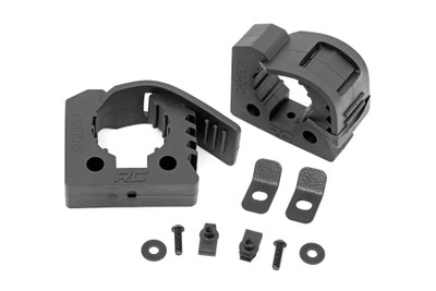 If you're looking for a way to securely transport your gear, look no further than Rough Country's Universal Rubber Clamp Kits. These adjustable, jaw-style clamps are perfect for holding shovels, axes, hoses, and other tools, and can be mounted horizontally or vertically to your vehicle, trailer, UTV, garage wall, or any other flat surface. They're made with durable rubber that can withstand heat, cold, and UV rays, so you know your gear will be safe no matter what the weather is like. Plus, they're easy to install with bolts or screws (sold separately). Order your Universal Rubber Clamp Kit today and rest easy knowing your gear is in good hands with Rough Country.