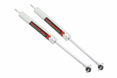 Whether you're tackling tough terrain or smooth city streets, Rough Country's Nitrogen-charged M1 Monotube Shock Absorber leads the way, delivering impeccable ride quality and performance mile after mile. Rough Country's Monotube M1 Shocks feature an internal floating piston design that keeps the shock oil and high-pressure nitrogen separate. The result is a lightning-fast reaction with no cavitation - just unbridled vibration damping at each and every obstacle. The M1 Monotube Shock Absorber is more than an upgrade - it's a true performance shock. Each shock features a steel body that is brushed and galvanized boasting a passivation sealing technology that is sure to withstand the elements. The internal 46mm digressive piston offers countless years of durability. The M1 is designed to be mounted body-up for a more interesting look on the vehicle.