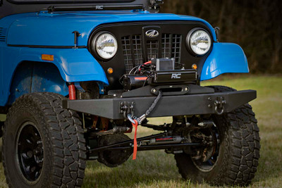 Bring the power of recovery to your front bumper with Rough CountryΓÇÖs Bolt-On Winch Plate for Mahindra Roxor! Take to the trails with peace of mind knowing you can easily recover your vehicle or help others when the time arrives.\
With an easy, 100% bolt-on install process, this handy upgrade goes on quick so youΓÇÖre ready to roll in no-time flat! This innovative mounting system is designed to work with your factory bumper and can accommodate all standard-sized winches. The durable 1/4in steel plate mounts directly to the frame and is powder coated black for a long life of good looks.