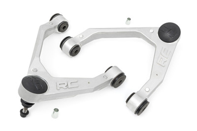 Durable One-Piece Design. Take your truck to the next level with Rough CountryΓÇÖs most durable Upper Control Arm to date! Rough CountryΓÇÖs Forged Upper Control Arms feature a solid, 1-piece design made of forged aluminum for superior strength and durability. This forged design outperforms all other types of arm construction, with no welding weak spots that could bend or break.\
High Strength Ball Joints. Rough CountryΓÇÖs Forged Upper Control Arms feature POM ball joints for a greater range of motion offering more wheel articulation than standard or OE replacements. These ball joints feature a Polyoxymethylene ball race with an extremely low coefficient of friction for longer life, and a larger ball diameter to improve range of motion with a maintenance-free design. Each ball joint is fully greaseable. Rough CountryΓÇÖs Forged Upper Control Arms also feature durable rubber bushings rubber bushings for superior quality and durability.\
Installation. Featuring a 100% bolt-on installation process, an estimated timeframe of 3-4 hours is recommended to complete this full installation. This full kit can be installed at home and can be completed efficiently and quickly!\
Limited Lifetime Replacement Warranty. Rough Country's Forged Aluminum Control Arms are backed with a limited lifetime replacement warranty towards manufacturer defects. As such, the product is protected from structural and workmanship damage after the date of purchase. With our industry-leading warranty give yourself peace of mind when using Rough Country's Suspension products!