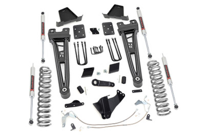 Compliment your 2015-2016 Ford F-250's aggressive, good looks with Rough Country's 6-inch Radius Arm Lift Kit for models without rear factory contact overload springs. Rough Country's 6-inch Lift Kit was engineered to retain the F-250's impressive factory specs while bumping up performance and durability where it's needed most. The result is an aggressive, lifted beast with a mean profile and balanced on and off-road ride quality.When changing a vehicle's suspension, the key to preserving ride quality is in keeping the geometry of all suspension components as close to their factory angles as possible. Rough Country's new 6-inch Radius Arm Suspension Lift features a set of ultra-durable Radius Arms, precision fit to bolt right into the factory mounts for an easier install and a more factory-like angle. At 27lbs each, these beefy, upgraded Radius Arms dwarf stock equipment while and feature durable durable rubber bushings for maximum vibration absorption.This all-inclusive kit also features an adjustable alignment cam at the axle to allow caster adjustment as well as a track bar relocation bracket and a drop pitman arm. A full set of N2.0 Shocks provide a truly balanced ride quality for on and off-road use - perfect for daily drivers. This kit also ships with a set of durable, lifted coil springs and brake line relocation brackets.This innovative kit design features a 100% bolt-on installation process that is lightning fast compared to other kits this size. Save time and money with no need for cutting, drilling, or other complicated procedures. Rough Country's 6-inch Radius Arm Lift Kit is backed by our Lifetime Replacement Warranty.