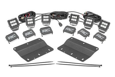Light Up the Night. Looking to add some serious lighting power to your Bronco? Look no further than Rough Country's Bronco Triple Cube Fog Light Mount Kit! This handy kit lets you fit an impressive three sets of Rough Country's 2-in cube lights on your factory steel bumper, increasing your lighting power and visibility during nighttime adventures. Each light contains six 3-watt high-intensity Cree LEDs, providing a brighter, more focused beam of light that will help you navigate any terrain with confidence.\
Made to Last.ΓÇ»The IP67 waterproof rating ensures that these lights can withstand the harshest conditions you can throw at them, from the mud and dirt of off-road trails to the concrete and asphalt of the city streets! The included LED lights produce an incredible 14,000 lumens, making it easy to see in even the darkest conditions. Additionally, the Moisture Breather technology reduces moisture build-up behind the lens, making sure your lights always perform at their best. So, whether you're driving through thick fog or inching your way down a dark trail, you can rest assured that you'll have the visibility you need.\
Installation.ΓÇ»This 100% bolt-on kit discreetly mounts into your OEM bumper, right in the factory fog light location. The brackets are hidden from view for a clean and flush factory-looking install. But don't let the sleek design fool you - this thing is built tough! Our kit also includes premium, flat-wound wiring harness with an on/off switch. No cutting or drilling is required, so you can get this installed and hit the trail in no time flat.\
Limited Lifetime Replacement Warranty. Rough Country's products are backed with a limited lifetime replacement warranty towards manufacturer defects. As such, the product is protected from structural and workmanship damage after the date of purchase. With our industry-leading warranty, give yourself peace of mind when using Rough Country's products!