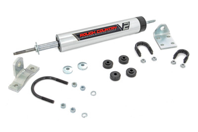 Take Control of Every Turn: Rough Country's V2 Steering Stabilizer Kit is engineered to eliminate bump steer, front-end shimmy, and steering vibration caused by rough roads or oversized tires. Whether you're hitting the trail or the pavement, it delivers a smoother, more predictable ride by dampening harsh feedback through the steering wheel.Fix Common Steering Issues: If your vehicle pulls to one side, feels loose after hitting a bump, or suffers from a shaky steering wheel - this stabilizer helps correct those problems. It absorbs sudden impacts that can throw off your handling and alignment, especially in lifted applications.Protect Your Steering System: Rough Country's stabilizer helps reduce wear and tear on key components like tie rods, ball joints, and tires. It's a must-have for vehicles running larger wheels or off-road setups, helping preserve performance and extend component life.Bolt-On Upgrade with Big Benefits: With a 100% bolt-on design, installation is fast and hassle-free. It's one of the easiest ways to improve handling, reduce road feedback, and reinforce the reliability of your steering system - backed by the trusted Rough Country name.