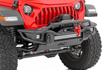 Transform the look and capabilities of your Jeep with Rough CountryΓÇÖs Tubular Front Bumper. This aggressive version of our fan-favorite Stubby Trail Bumper includes a few extra features youΓÇÖre sure to enjoy!\
Rough CountryΓÇÖs Jeep Tubular Front Bumper has been engineered with a robust design that fits in nicely with the factory flare or aftermarket modifications. With Jeep adding turn signals to the factory flares on JL and JT models, a full-width bumper can help lend an aggressive off-road look to your Jeep even when retaining the factory flare.\
Each kit includes a modular integrated fog light mount that allows you to run the included Rough Country 2-inch led cubes boasting an impressive 2800 lumens and 36 watts. This front bumper also features a built-in Rough Country 20in Dual-Row Black-Series LED Light Bar, providing 9,600 lumens and 120 watts of forward-facing illumination to help you easily see the trail ahead.\
Rough CountryΓÇÖs Tubular Front Bumper also features a set of D-ring shackles for a convenient recovery point, as well as a protective skid plate that ensures unbeatable protection in off-road environments. If youΓÇÖre looking for one of the best Jeep bumpers available, look no further!