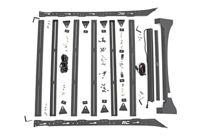 If youΓÇÖre looking for an eye-catching upgrade thatΓÇÖs also practical, Rough CountryΓÇÖs Roof Rack Kit is easily the best roof rack on the market! This bolt-on Ford roof rack offers plenty of room to haul all of your gear without sacrificing space inside the vehicle. Rough CountryΓÇÖs Ford Roof Rack Kit features 4 durable steel slats to help you firmly secure your gear and is available with optional front and rear LED lights for off-road illumination when you need it most.┬á\
Whether youΓÇÖre heading out on an overland adventure or you just find yourself needing extra space to haul your gear, this convenient Ford cargo rack is a lifesaver! The corrosion-resistant black powder coat and bold design elements give your F-150 an aggressive, good look even when the rack is empty. Each unit is available with an optional front-facing 40in LED or a rear 40in LED providing over 32,000 lumens of combined lighting power.┬á\
This easy to install kit features an easy, 100% bolt-on installation process with minor drilling required and can support up to 250lbs - plenty of strength to haul all of your gear!