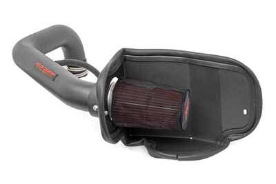 Gain increased horsepower and throttle response while protecting your engine from harmful particles and debris with Rough CountryΓÇÖs Cold Air Intake System. This intake system moves the air filter away from the stuffy engine compartment so cooler air can be circulated into the engine for an increase in power. Cooler air is denser, and brings more oxygen into the combustion chamber to help your vehicle perform at its greatest potential. The cylindrical design and large diameter tube allow Rough CountryΓÇÖs Cold Air Intake System to provide far better airflow than the factory air filter enclosed in a box.Each unit includes a premium, reusable air filter thatΓÇÖs easy to clean for a long life of great performance. This easy to install device goes on in a snap for an instant increase in performance. Includes a Limited Lifetime Warranty. \
\