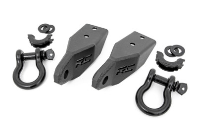 Give your vehicle an upgraded recovery option that offers a more aggressive look with Rough CountryΓÇÖs Tow Hook to Shackle Conversion Kit!\
This easy-to-install upgrade replaces your factory tow hooks with a durable d-ring shackle mount thatΓÇÖs easier to access and gives the front of your vehicle an eye-catching look. Rough CountryΓÇÖs Shackle Mount bolts directly to the frame providing the same strength and durability as your factory tow hooks to aid in recovery in any situation. Each mount is powder coated black for a long lifespan of good looks and is designed to work with both factory and many aftermarket bumpers. The mounting point was engineered to accept any 3/4in d-ring shackle, allowing you to customize the look of your vehicle.\
Featuring a 100% bolt-on installation process, this great-looking upgrade can be installed in a flash! Simply remove the factory tow hooks and install Rough CountryΓÇÖs Tow Hook to Shackle Conversion Kit into the factory tow hook mounting points and youΓÇÖre ready to roll! Best of all, each mount is covered by Rough CountryΓÇÖs Lifetime Replacement Guarantee!