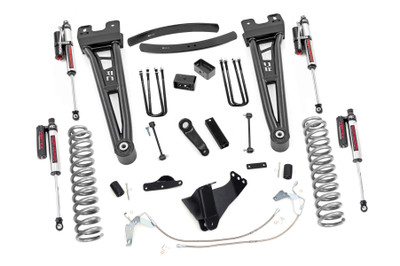 Compliment your 08-10 Ford F-250/350's aggressive, good looks with Rough Country's 6-inch Radius Arm Lift Kit. Rough Country's 6-inch Lift Kit was engineered to retain the F-250/350's impressive factory specs while bumping up performance and durability where it's needed most. The result is an aggressive, lifted beast with a mean profile and balanced on and off-road ride quality. When changing a vehicle's suspension, the key to preserving ride quality is in keeping the geometry of all suspension components as close to their factory angles as possible. Rough Country's new 6-inch Radius Arm Suspension Lift features a set of ultra-durable Radius Arms, precision fit to bolt right into the factory mounts for an easier install and a more factory-like angle. At 27lbs each, these beefy, upgraded Radius Arms dwarf stock equipment while and feature durable durable rubber bushings for maximum vibration absorption. This all-inclusive kit also features an adjustable alignment cam at the axle to allow caster adjustment as well as a track bar relocation bracket and a drop pitman arm. A full set of Vertex Adjustable Reservoir Shocks┬áprovide a truly balanced ride quality for on and off-road use - prefect for daily drivers. This kit also ships with a set of durable, lifted coil springs and brake line relocation brackets. This innovative kit design features a 100% bolt-on installation process that is lightning fast compared to other kits this size. Save time and money with no need for cutting, drilling, or other complicated procedures. Rough Country's 6-inch Radius Arm Lift Kit is backed by our Lifetime Replacement Warranty.
