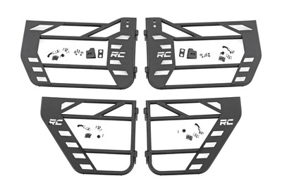 Put the wind in your hair and freedom at your fingertips with Rough CountryΓÇÖs Steel Tube Doors! These durable, steel doors give your vehicle an aggressive look while giving you increased visibility without sacrificing safety.ThereΓÇÖs little in this world that can match the feeling of riding in a Jeep with nothing between you and the world around you! Rough CountryΓÇÖs easy-to-install tubular steel doors allow you to keep your occupants safe while enjoying the open air. These durable, 1.25in diameter tube steel doors with integrated latching system keep everyone contained and comfortable for the duration of the journey. Rough CountryΓÇÖs Tube Doors feature a high-quality, black powder coat thatΓÇÖs designed to resist corrosion for a long lifespan of good looks. The simple bolt-on installation process makes them easy to install, allowing for a total transformation of your Jeep in no-time flat! Each front tube door Includes a mounting point to attach the factory mirrors. \
\