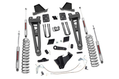 Compliment your 2015-2016 Ford F-250's aggressive, good looks with Rough Country's 6-inch Radius Arm Lift Kit for models without rear factory contact overload springs. Rough Country's 6-inch Lift Kit was engineered to retain the F-250's impressive factory specs while bumping up performance and durability where it's needed most. The result is an aggressive, lifted beast with a mean profile and balanced on and off-road ride quality.When changing a vehicle's suspension, the key to preserving ride quality is in keeping the geometry of all suspension components as close to their factory angles as possible. Rough Country's new 6-inch Radius Arm Suspension Lift features a set of ultra-durable Radius Arms, precision fit to bolt right into the factory mounts for an easier install and a more factory-like angle. At 27lbs each, these beefy, upgraded Radius Arms dwarf stock equipment while and feature durable durable rubber bushings for maximum vibration absorption.This all-inclusive kit also features an adjustable alignment cam at the axle to allow caster adjustment as well as a track bar relocation bracket and a drop pitman arm. A full set of N3 Shocks provide a truly balanced ride quality for on and off-road use - perfect for daily drivers. This kit also ships with a set of durable, lifted coil springs and brake line relocation brackets.This innovative kit design features a 100% bolt-on installation process that is lightning fast compared to other kits this size. Save time and money with no need for cutting, drilling, or other complicated procedures. Rough Country's 6-inch Radius Arm Lift Kit is backed by our Lifetime Replacement Warranty.