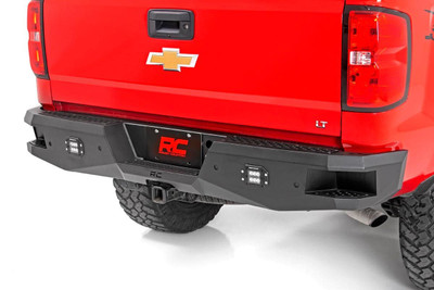 Give the rear of your GM 1500an aggressive, new appearance with Rough CountryΓÇÖs Rear LED Bumper. This easy-to-install upgrade gives your truck an improved look and better functionality. Each bumper features two Rough Country Black-Series 2in LED Flush Mount Cubes for rear illumination, and two integrated steps for easy access to the bed. Rough CountryΓÇÖs Rear LED Bumper is made of a durable, all-steel construction thatΓÇÖs ready to handle whatever you dish out. Each bumper also includes sensor relocators to allow you to retain the vehicleΓÇÖs anti-collision system. Unlike some aftermarket bumpers for this model, Rough CountryΓÇÖs LED Rear Bumper allows you to retain the factory receiver hitch for towing. Complete the look with Rough CountryΓÇÖs Front LED Bumper for a total transformation of your truck. Includes a 3-year Warranty!
