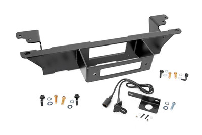 A sleek recovery solution that looks like factory equipment! Rough Country's Hidden Winch Plate for 99-06 Chevy / GMC 1500 offers a stylish approach for adding a recovery system to your pickup.Rough CountryΓÇÖs GM hidden winch plate can fit most standard size winches up to 12,000 lbs and does not impede air flow to the radiator. Unlike many hidden winch solutions, Rough Country's GM Hidden Winch Plate boasts an easier install process that does NOT require moving your factory bumper from stock location. This kit also includes a wiring extension that allows you to easily connect your winch remote even though the unit is recessed into the bumper!With a black powder coated 1/4in Steel Frame and Grade 8 Hardware, this Winch Plate is ready to stand up to the elements, on and off-road. Includes Rough CountryΓÇÖs Lifetime Replacement Guarantee!