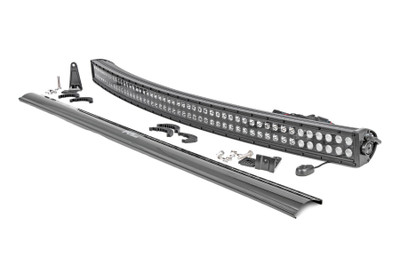 Command the Dark: Light up the night and stay on the trails longer with Rough Country's 50-inch Curved Dual Row CREE LED Light Bar. This powerful light bar offers 23,040 lumens of illumination and 288 watts of energy-efficient output, all housed in a stylish, modern frame. Featuring 96 high-intensity 3-watt CREE LEDs, it delivers superior brightness and durability for any adventure.The sleek black panel design complements vehicles with black accents, such as grilles, wheels, bull bars, or steps. Designed for all-weather performance, this light bar comes with a durable die-cast aluminum housing, ensuring maximum strength and heat dissipation. ItΓÇÖs also backed by an IP67 waterproof rating, providing reliable performance even in harsh conditions.Installation is made simple with the included premium, flat-wound wiring harness, complete with an on/off switch for easy operation. The light bar also features Rough Country's Light Bar Noise Silencers, designed to eliminate unwanted hums, whistles, and wind noise typically found in mounted LED light bars.This light bar includes both end mounts and adjustable base mounts, offering multiple mounting options for maximum versatility. A snap-on cover protects the lens, while Moisture Breather technology reduces moisture build-up inside the light. Plus, itΓÇÖs all backed by a 3-year warranty for peace of mind.