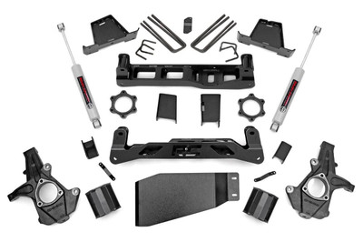 Aggressive Stance Meets Daily Comfort: Unlock the perfect blend of form and function with Rough Country's 6-Inch Suspension Lift Kit for Chevy Silverado 1500/GMC Sierra 1500 pickups. This kit supports up to 295/60R20 tires on factory 20-inch wheels, giving your truck a bold, commanding presence without the need for aftermarket wheels.Level and Trail-Ready in One Package: Say goodbye to factory rake this lift achieves a clean, leveled stance from front to rear while maximizing clearance thanks to high-clearance crossmembers and laser-cut lifted knuckles engineered for a precision fit. Built for trail performance and street appeal, every component is crafted using advanced CAD technology for unmatched durability.Hassle-Free Installation with No Compromises: Enjoy a smooth install with no need to modify your drivetrain, exhaust, or differential. The kit is designed for a straightforward bolt-on setup no strut disassembly required saving you time and effort in the garage.Engineered for Strength and Stability: Tackle rough terrain with confidence using heavy-duty fabricated lift blocks that outlast traditional cast designs. Anti-axle wrap rear blocks preserve factory ride comfort while solving common lift-related issues.Customize Your Ride Quality: Dial in your suspension with configurable shock and strut options, including our nitrogen-charged N3 series or the high-performance M1 Monotube, so you get the ride feel that matches your driving style.Backed by Confidence: As always, this kit includes Rough Country's Limited Lifetime Replacement Warranty, ensuring peace of mind on every mile.