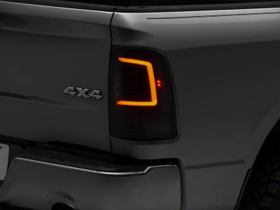 Raxiom 09-18 Dodge RAM 1500 Axial Series LED Tail Lights- Black Housing- Smoked Lens - R113540 Photo - Primary