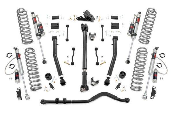 When it comes to your two-door Jeep JL, we know you need a lift that won't let you down. Our 3.5 Inch Lift Kit delivers legendary off-road prowess and smooth on-road handling.\
Increased Ground Clearance: Get ready to conquer those rocky trails and rough terrains like a boss! Our lift kit gives your Jeep Wrangler the extra inches it needs to clear obstacles with ease.Front-to-Rear Leveling: Tired of that nose-down stance? Ditch the unbalanced Jeep life with our leveling kit. We bring symmetry to your ride, lifting the front to match the rear, giving you a smooth and steady journey.Tuned Coil Springs for Superior Performance: Your Jeep's handling and ride quality matter, and we get that. Our coil springs come dialed in with OEM spring rates, delivering top-notch handling and a plush ride. Our linear coil rate springs take it up a notch, ensuring impeccable handling and stability, even when the terrain gets wild.Additional Tire Clearance: Who doesn't want bigger, beefier tires? Our lift kit makes room for larger tires (up to 35 inches), giving your Jeep a more aggressive look that will turn heads on and off the road!Heavy-Duty Track Bar: Our included track bar is an absolute beast, constructed from forged solid steel for unparalleled strength and durability. With its massive 1.25-inch outside diameter and rugged OEM-style rubber bushings, it's built to handle anything the off-road throws its way.Durable CV Driveshaft: The factory shaft does not have adequate clearance once lifted and will cause damage to the Rzeppa joint if the driveshaft spins while the suspension is fully flexed or articulated. Rough Country's extended Front CV Driveshaft eliminates this issue allowing you to flex your suspension with more peace of mind!Easy Installation: We know you'd rather be off-roading than in the garage all day. That's why our lift kit is designed for easy installation, so you can hit the trails in no time.