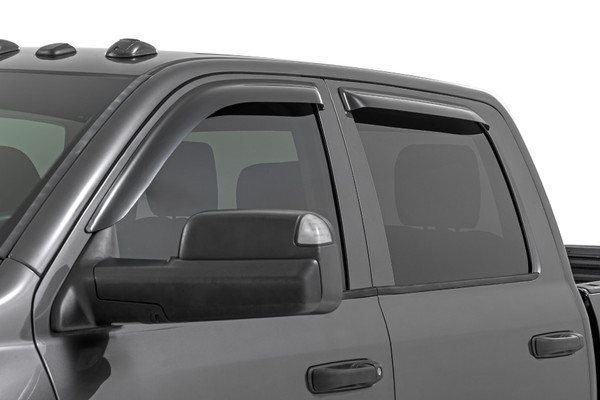 Upgrade Your Ride with Premium Tape-On Wind Deflectors: Enhance your driving experience with Rough Country's premium tape-on wind deflectors. Designed for quick and secure installation, these deflectors apply directly to the window frame using pre-applied automotive-grade adhesive, no tools or drilling needed.All-Weather Comfort: Keep your windows cracked in rain, snow, or heat without letting the elements inside. Our deflectors promote fresh airflow while keeping your cabin dry and comfortable in any condition.Quieter, More Comfortable Drives: Reduce wind noise and turbulence when driving with your windows partially open. Whether on your daily commute or a long road trip, you'll enjoy a quieter, more relaxing ride.Bold, Stylish Appearance: Give your vehicle a distinctive look with a contoured, aerodynamic profile that complements its exterior design. These deflectors deliver both function and flair.Custom Fit for Your Vehicle: Each set is precision-engineered for a perfect, model-specific fit that aligns flawlessly with your window frame for reliable performance and a factory-finished appearance.