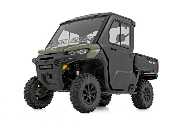 Complete Cab Protection: Equip your Can-Am Defender with Rough Country's UTV Side Doors for unmatched shielding from the elements. Whether you're plowing through mud, braving a rainstorm, or kicking up dust on the trail, these full doors are designed to keep your cab clean, dry, and comfortable in any condition.Built to Handle Anything: Constructed from solid vacuum-formed Thermoplastic Polyolefin (TPO), these doors offer a lightweight yet incredibly durable solution for rugged off-road use. Scratch-resistant and fade-proof, they're built to look good and perform even after countless adventures.Smart Functionality: Each door features a sliding glass window for quick ventilation and easy communication without sacrificing protection. The full edge seal helps block out water and dust, keeping your interior protected and your ride smooth.Secure and Reliable: A lockable handle adds a layer of security and convenience, so you can park with confidence wherever the trail takes you.Upgrade your ride with the ultimate in comfort, protection, and durability only from Rough Country.