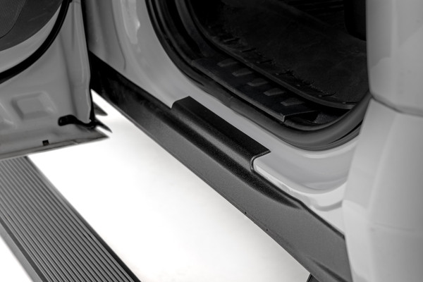 The rocker area of your fourteenth-generation Ford F-150 faces constant threats from trail rocks, road grime, and daily wear. Scratches and dents are inevitable, but that doesnΓÇÖt mean it has to show. Rough CountryΓÇÖs Rocker Sill Plates offer the perfect solution to protect your truckΓÇÖs most vulnerable spots while hiding those unsightly pinch welds and rust. Rugged, stylish, and easy to install, these plates will keep your F-150 looking sharp, whether you're conquering the trails or cruising the streets.Maximum Protection: Shields your rocker area from scratches, chips, and dentsΓÇöbecause your truck deserves to stay in pristine condition, no matter where you take it.Hide the Ugly Stuff: Covers up rusty pinch welds and other eyesores, giving your F-150 a clean, finished look thatΓÇÖll turn heads.Built Ford Tough: Constructed from high-density thermoplastic, these sill plates are designed to withstand whatever the trail or the parking lot can throw at them.UV-Resistant Finish: UV protection ensures they stay looking fresh and vibrant, even under the harshest sun exposure.Simple Installation: Quick and easy to install with clips and 3M automotive adhesiveΓÇöno tools, no drilling, no stress.Reversible Design: Can be easily removed to return your truck to its original stock look, whenever you choose.Rough CountryΓÇÖs Rocker Sill Plates for your Ford F-150 combine rugged protection with sleek style. Keep your truck looking sharp and ready for whatever comes next.