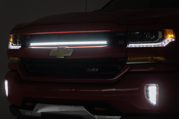 Tired of being caught in the dark? Our Grille Mount LED Light Kit is the answer to your nighttime needs. Designed specifically for the third/fourth generation Chevy Silverado 1500, this kit brings the brightness you need to tackle those moonless nights and foggy mornings with confidence.Blazing Brightness: This kit packs 162 LED chips that provide a powerful beam to light up even the darkest trails, ensuring you see every rock, rut, and mud puddle in your way.Durable Materials: Our lights, featuring a tough-as-nails aluminum housing and IP68 waterproof rating, are ready to withstand Mother Nature's wrath.Precision Lighting: The nylon reflector and silicone lens surface work together to deliver a focused, clear light. Say goodbye to scattered beams and hello to a sharp, consistent light that shows you exactly where youΓÇÖre headed.Long-Lasting Power: Running on 12V power and 16 watts, these lights are built to last over 50,000 hours. That's a whole lot of night drives, camping trips, and late-night work sessions.Complete Kit: No need to hunt down extra parts ΓÇô this kit includes everything you need: mounting brackets, hardware, and harness. Just mount it, wire it up, and hit the road.The Grille Mount LED Light Kit for your Chevy Silverado 1500 is the upgrade you didnΓÇÖt know you needed but wonΓÇÖt be able to live without. Whether youΓÇÖre navigating rugged terrain or setting up camp after dark, this kit has you covered. Light up the night with Rough CountryΓÇÖs Grille Mount LED Light Kit!
