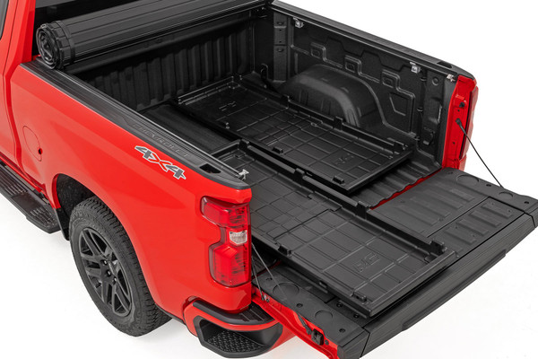 Take your truck's storage game to the next level with Rough Country's Truck Bed Cargo Storage Tray, designed with truck enthusiasts in mind. Whether you're hauling tools, gear, or weekend adventure essentials, this long bed storage tray offers the perfect blend of rugged durability and easy access.Quick and Easy Install: Get organized in no time with a hassle-free installationΓÇöno drilling required.UV Protected: Built to withstand the elements, the tray is UV protected to prevent fading, so it stays looking sharp even after years of tough use.Built to Last: Constructed from high-molecular weight polyethylene, this tray is made to handle the roughest conditions without backing down.Removable Design: Keep your truck's versatility intact. The tray is easily removable if you need to bring your bed back to stock.3-Year Limited Warranty: With Rough CountryΓÇÖs trusted 3-year limited warranty, youΓÇÖre backed by quality and reliability for the long haul.Whether you're off-roading, towing, or simply working hard, Rough Country brings the strength, style, and functionality you need to keep your gear organized and your truck looking its best. Upgrade your truck bed today and experience the Rough Country difference!