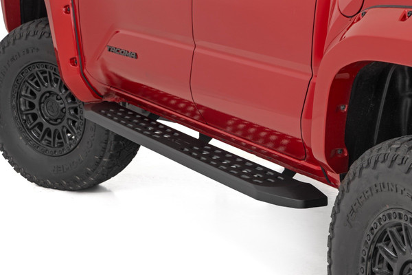 Elevate your style. Add a touch of the wild to your ride with Rough Country's Raptor-inspired running board side steps! Made from durable, rust-resistant steel, they feature a slimmer design that looks great on lifted vehicles. And if that's not enough, we've added dimple die holes for extra traction - ensuring you'll be safe and stable when stepping onto your running boards.Steady and Stylish. Our RPT2 running boards feature a 6.75-inch wide stepping area, perfect for getting in and out of your cab with ease. Plus, they're coated in matte black powder for a sleek, finished look. And if you're worried about safety, don't be! Our non-slip design ensures that you'll stay steady on your feet. Plus, the one-piece steel construction ensures that these steps will last for years to come.Installation. These side steps are a must-have for anyone looking to make their Chevy/GMC stand out from the crowd. With an easy installation that doesn't require any drilling or cutting, these running boards can be installed at home in just 1-2 hours. Transform your truck with Rough Country's RPT2 Running Board Side Steps.Warranty. Rough Country's Running Board Side Steps are backed with a five-year replacement warranty towards manufacturer defects. As such, the product is protected from structural and workmanship damage after the date of purchase. With our industry-leading warranty, give yourself peace of mind when using Rough Country's products!