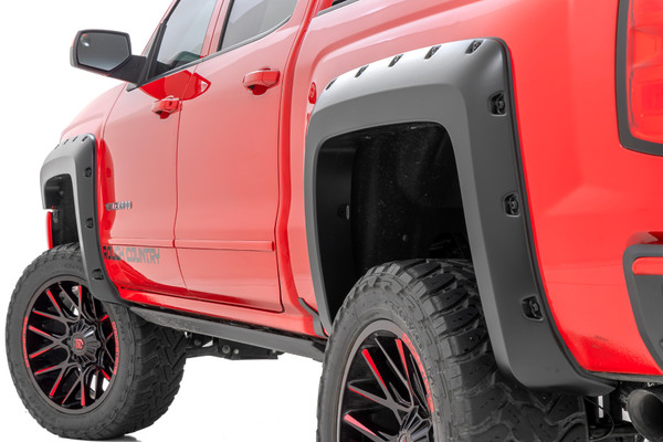 Add aggressive good looks quickly and easily with Rough Country's Fender Flares. Nothing compliments a new lift, wheels, and tires like a set of stylish, mean-looking fender flares. Rough Country's Fender Flares are designed with a simulated riveted look. These fender accessories bolt-on quickly and easily in a few secure mounting points, making installation a cinch. No cutting or drilling is required to install, and these flares can be easily removed and return your truck to stock! These UV treated fender flares ship in flat-black or can easily be painted to match your vehicle, and are designed to withstand the sun, rain and other elements of nature. Rough Country Fender Flares are guaranteed to be free of defects for 3 years!