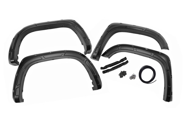 Innovative Design. ItΓÇÖs time to stand out from the crowd and rise above your peers. Increase your truck's tire coverage with Rough Country's Defender Flares for the second-generation Toyota Tundra. These aggressively good-looking flares transform your Tundra's exterior boasting 2-inches of tire coverage. These uniquely designed flares are sure to protect your Tundra's body from mud or road debris kicked up by the tires.\
Durable Construction. With everyday truck drivers in mind, Rough Country designed a Fender Flare that recognizes your expectations for tough tactical design, and your right to demand products with high reliability and outstanding quality. Don't settle for anything less! Rough Country's Defender Flares are designed to handle on or off-road terrain. Rough Country's fender flares are constructed of a smooth ABS UV-protected KoradΓäó plastic. This material is lightweight and can endure the elements. The UV treatment process eliminates chalking and helps prevent sun fading.\
Limited Lifetime Replacement Warranty. Rough Country's Defender Flares are backed with a limited lifetime replacement warranty towards manufacturer defects. As such, the product is protected from structural and workmanship damage after the date of purchase. With our industry-leading warranty give yourself peace of mind when using Rough Country products!\