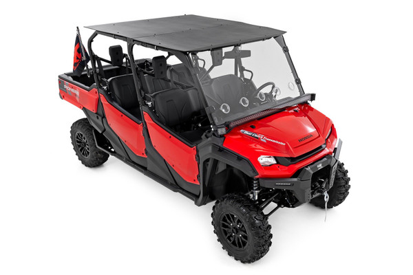 Upgrade your Pioneer. Don't let the elements ruin your ride - get the UTV Roof for your Honda Pioneer 1000-6 today! Rough Country's UTV roof is designed to keep you and your passenger protected, no matter what Mother Nature throws your way. With its wide construction, you can say goodbye to water splashes inside your cab - this roof will make sure it stays outside where it belongs. So, whether you're out for a relaxing ride or tackling tough trails, this roof is the perfect accessory to upgrade your UTV experience.\
Extremely durable. Not only does this Roof protect you and your passenger, but it's also built to last. Our UTV Roof is made of a single piece of HDPE (High-Density Polyethylene) and can resist UV rays and tough conditions. So you can count on it to protect you and your passenger from the weather year after year.\
Installation. Installing this UTV Roof is quick and easy, thanks to its 100% bolt-on design and includes all hardware needed. The roof attaches firmly to the roll cage of your Can-Am, providing a secure and stable fit. This design improves wind resistance during hauling, making it a safe and reliable choice for transportation.\
Warranty. Rough Country's HDPE UTV Roofs are backed with a limited lifetime replacement warranty for manufacturer defects. As such, the product is protected from structural and workmanship damage after the date of purchase. With our industry-leading warranty, give yourself peace of mind when using Rough Country's products!