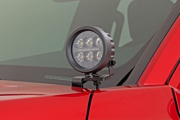 Light the Way!ΓÇ»Get the ultimate in truck lighting and safety with Rough Country's Ditch Mount LED Lights. These high-performance Ditch Mounts are specifically designed for your fourth-generation Toyota Tacoma to add extra side lighting for increased visibility in the dark. With multi-angle capability, you can move them in the direction you want. Our low-profile design means they will not affect the opening or closing of the hood or block your windshield wipers. So, you can hit the trails in style with superior nighttime illumination.\
Durable Protection. These Tacoma Ditch Mount LED lights were designed to withstand the harsh outdoor elements while providing you with clear visibility. Constructed with a 7-gauge material for improved strength and reduced vibration that can occur on bumpy roads, this light boasts a durable black finish powder coating against corrosion. With an IP67 waterproof rating, they are great for any vehicle, whether on or off-road!\
Installation and Warranty. The Rough Country Tacoma Ditch Mount LED Light Bars are the perfect combination of performance and style, offering a high-quality lighting solution without taking up valuable space on the front of your vehicle. This kit includes a complete set of mounting brackets and hardware, with vehicle-specific hood hinge brackets to ensure an easy and perfect fit on your Tacoma. This product features our Limited Lifetime Warranty, so you can rest assured knowing you're covered.