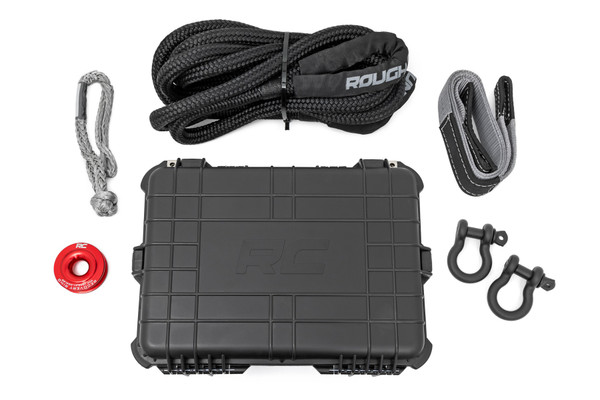 Got a winch but missing the muscle to get the job done? Rough Country's Winch Recovery Kit is your one-stop shop for turning your winch into a recovery powerhouse. This kit provides all the essential gear to tackle tough situations on your own terms so you can get back to enjoying the ride.\
Packed with must-have items like a Kinetic Rope, Tree Saver, D-rings, and more, this kit ensures you're prepared for any terrain challenges. Plus, it all comes neatly organized in a waterproof, impact-resistant polymer carry case, so you can easily store it in your vehicle without worrying about damage. Stay prepared and conquer the trail with Rough Country's Winch Recovery Kit.