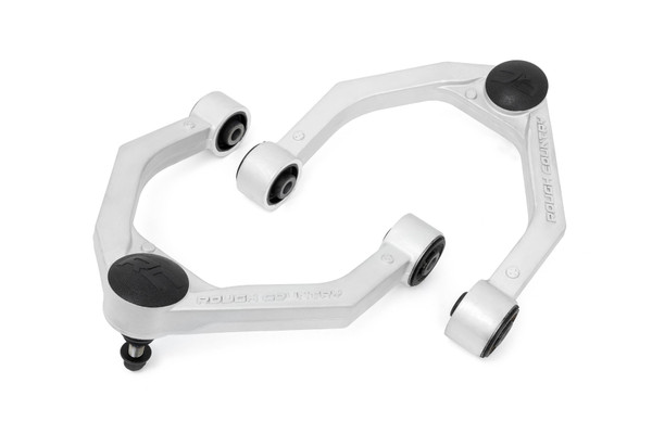 Durable One-Piece Design. Take your truck to the next level with Rough CountryΓÇÖs most durable Upper Control Arm to date! Rough CountryΓÇÖs Forged Upper Control Arms feature a solid, 1-piece design made of forged aluminum for superior strength and durability. This forged design outperforms all other types of arm construction, with no welding weak spots that could bend or break.\
High Strength Ball Joints. Rough CountryΓÇÖs Forged Upper Control Arms use POM ball joints which reduces metal-to-metal contact for less maintenance and longer service life versus standard or OE replacements. These Ball joints feature a POM ball race for an extremely low co-efficient of friction and an oversize ball diameter reduces load and improves range of motion in a fully greaseable design. Rough CountryΓÇÖs Forged Upper Control Arms also feature durable rubber bushings rubber bushings for superior quality and durability.\
Installation. Featuring a 100% bolt-on installation process, an estimated timeframe of 3-4 hours is recommended to complete this full installation. This full kit can be installed at home and can be completed efficiently and quickly!\
Limited Lifetime Replacement Warranty. Rough Country's Forged Aluminum Control Arms are backed with a limited lifetime replacement warranty towards manufacturer defects. As such, the product is protected from structural and workmanship damage after the date of purchase. With our industry-leading warranty give yourself peace of mind when using Rough Country's Suspension products!