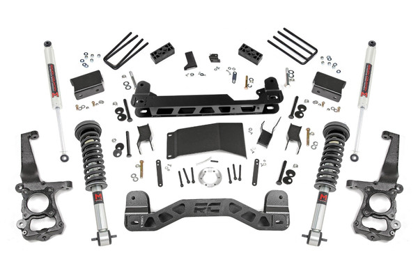 Transform Your F-150 with Rugged Style and Trail-Ready Performance: Give your Ford F-150 a bold new stance and unstoppable capability with Rough Country's 4-Inch Suspension Lift Kit. Designed for aggressive off-road performance and a head-turning look, this all-inclusive kit equips your truck for the path less traveled.Run Up to 33-Inch Tires with Confidence: Gain the clearance you need to conquer rough terrain. This kit includes durable lifted knuckles and strut spacers, providing room for larger tires while maintaining optimal geometry.Engineered for a Factory-Like Ride: Precision-designed differential drop brackets, sway-bar brackets, brake line extensions, and a driveshaft spacer work together to maintain proper angles, ensuring a smooth, controlled ride, even with added lift.Heavy-Duty Crossmembers Built to Last: Front and rear crossmembers are reinforced for maximum strength and feature a modern design tailored to fit newer F-150 models seamlessly.Level Stance, OEM Compatibility: The system levels the front with the rear for a clean, aggressive profile, and retains the factory track width. Works with 18-inch or larger factory wheels* for hassle-free fitment.Stronger, Longer-Lasting Rear Blocks: Fabricated rear blocks are engineered to outperform and outlast cast alternatives, delivering enhanced durability in demanding conditions.Ride Quality You Control: Fully Configurable with Shock/Strut Options: Choose from nitrogen-charged N3 shocks for balanced performance, or upgrade to M1 Monotube shocks for enhanced ride precision and heat dissipation.Built-In Anti-Axle Wrap Design: Specially designed rear blocks combat axle wrap and eliminate common lift block issues, all while preserving the factory ride feel.Peace of Mind Included: Rough Country backs this kit with a Limited Lifetime Replacement Guarantee, ensuring your suspension is ready for whatever comes next.
