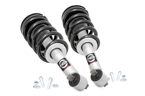Do you want a great looking truck that still rides like the day you bought it? Our Nitrogen charged, loaded struts add superior ride quality to your truck while maintaining a stock, factory ride height. Each strut includes a pre-loaded coil for lightning-fast installation without the need for complicated strut disassembly.\
Rough CountryΓÇÖs Performance N3 Struts feature a massive bore and chrome-hardened piston rod with leak-proof piston seal for exceptional durability during off-road use. Each strut is specifically tuned for its intended application and includes a variable dampening system for outstanding handling and control on all road conditions. These Performance N3 Struts offer improved tire contact with the road for increased stability and performance.\
These struts are engineered to fit perfectly on each intended application, and feature a pre-installed coil spring for easy installation without the need for strut disassembly. Simply remove your factory strut and replace with this easy, convenient system. Add this upgrade to your lift kit for an increased ride quality that mimics the factory responsiveness and handling of the OE strut. Includes a 3-year Limited Warranty.