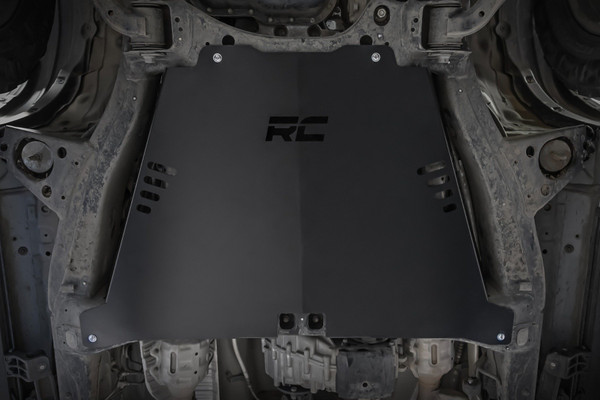 Are you tired of constantly worrying about the safety of your valuable catalytic converter while navigating through rough roads, speed bumps, and potential hazards? Look no further than Rough CountryΓÇÖs Anti-Theft Skid Plate for the 07-21 Tundra ΓÇô a game-changing solution designed to safeguard your vehicle's catalytic converter while providing unparalleled peace of mind. Crafted to tackle the challenges of the road head-on, our skid plate stands out from the rest thanks to its impressive range of unique features.\
Robust 14-Gauge Steel Construction: Crafted from heavy-duty 14-gauge steel, the Tundra skid plate is built to withstand the test of time. Its remarkable durability ensures your investment is protected against impact, debris, and various road hazards, giving you the confidence to explore without limitations.\
Complete Catalytic Converter Protection: Our Tundra Anti-Theft Skid Plate acts as a formidable shield for your catalytic converter, shielding it from potential damage caused by road debris, pesky speed bumps, and other unforeseen obstacles.\
Anti-Theft Design: Our skid plate not only provides physical protection but also deters theft attempts, effectively reducing the risk of losing your catalytic converter to would-be thieves.\
Powder-Coated Finish: The Tundra Anti-Theft Skid Plate boasts a resilient powder-coated finish that adds an extra layer of defense against corrosion, ensuring that your investment remains pristine even in challenging weather conditions.\
Effortless Bolt-On Installation: We understand the importance of convenience, which is why our skid plate features an easy bolt-on installation process.\
With the Rough Country Anti-Theft Skid Plate, youΓÇÖll never compromise your vehicle's safety and security again.