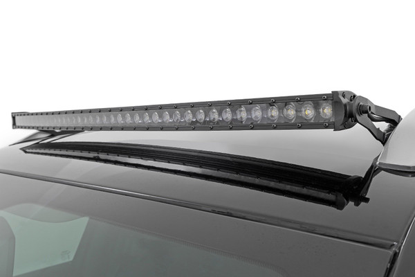 Light the Way! Get the ultimate in Jeep lighting and safety with Rough Country's 40" LED light kit for the Cherokee KL. Taking to the path less traveled can be an obstacle when the sun goes down. We've created a must-have solution to remedy the less illuminated paths.\
Durable Protection Take to the trails with Rough Country's roof mount 40" LED kit. This modern solution is the perfect accessory to provide a staggering 16,000 lumens of bold illumination. Featuring a sleek black panel design offering jaw-dropping good looks that blend perfectly with any vehicle using black accents like grilles, wheels, bull bars or steps! Rough CountryΓÇÖs LED Light Bars include a durable die-cast aluminum, IP67 waterproof housing for unsurpassed protection against the elements. Each LED also features a premium flat-wound, braided, IP68 waterproof wiring harness with a toggle switch and in-line fuse. Tired of wind noise? Each LED Light Bar includes a set of noise silencers to eliminate harmonic vibration caused by wind hitting the light at higher speeds.\
Installation and WarrantyBest of all, installation is a breeze. Simply remove the stock rail cap covers and install our low-profile windshield bracket and be prepared to command the dark! For peace of mind, each LED also includes Rough CountryΓÇÖs 3-year Warranty