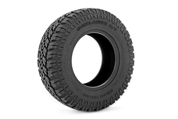 Here at Rough Country, we are always aiming to raise the bar high and keep our standards even higher. After you lift your vehicle the next step is to equip it with a high-quality tire, and we are here to ensure that you are covered. Introducing Rough Country's signature line of tires, behold our Overlander Edition.┬á\
We have taken to the drawing boards to ensure that we have pulled all of the stops when creating this behemoth of a tire. Featuring a steel-belted radial tubeless design these tires are specifically designed with you in mind to provide longer tread life, performance, and handling. Our aggressive design compliments the lifted lifestyle boasting an aggressive tread pattern and is equipped to tackle all environments from snow to mud and everything in between.┬á\
Best of all, Rough Country's Overlander tires offer Rough Country's manufacturers warranty. Set your vehicle apart from the pack and set yourself up for success no matter the road condition with Rough Country's Overlander tires!