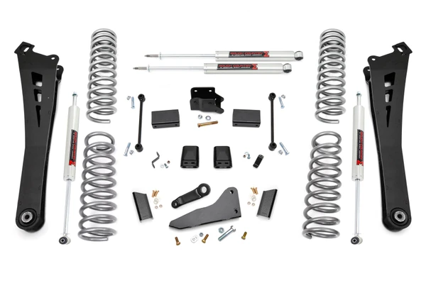 Compliment your RAM 2500's aggressive, good looks with Rough Country's new 5-inch Lift Kit with lifted coil springs. New model RAM Trucks come with a wealth of impressive features right from the factory. Rough Country's new 5-inch kit was engineered to retain these impressive factory specs while bumping up performance and durability where it's needed most. The result is a lifted beast with a mean profile and lush ride-quality that'll make other RAM owners wonder where you got yours from!Rough CountryΓÇÖs 5-inch Lift Kit is designed for Dodge RAMΓÇÖs equipped with either factory rear coils or factory rear air ride suspension. On Air Ride models, this kit uses a rear air bag spacer that works with the factory air bag to provide rear lift. This kit also features a Rear Sensor Arm Relocation Bracket that can modify how the sensor link speaks to the computer to determine what the ride height is. This allows you to adjust the amount of rear height up to 1-inch higher than the front by way of multiple mounting points spaced by 1/4-inch. Pick the mounting point you want for the rear ride height you prefer.When changing a vehicle's suspension, the key to preserving ride quality is in keeping the geometry of all suspension components as close to their factory angles as possible. Rough Country's new 5-inch Suspension kit features a set of ultra-durable Radius Arms, precision fit to bolt right into the factory mounts for an easier install and a more factory-like angle. These beefy, upgraded Radius Arms also feature a durable, durable rubber bushings for maximum vibration absorption. This kit also includes a set of front, lifted coil springs for unparalleled ride quality from your lifted Dodge Ram.