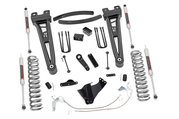Compliment your 08-10 Ford F-250/350's aggressive, good looks with Rough Country's 6-inch Radius Arm Lift Kit. Rough Country's 6-inch Lift Kit was engineered to retain the F-250/350's impressive factory specs while bumping up performance and durability where it's needed most. The result is an aggressive, lifted beast with a mean profile and balanced on and off-road ride quality.\\
When changing a vehicle's suspension, the key to preserving ride quality is in keeping the geometry of all suspension components as close to their factory angles as possible. Rough Country's new 6-inch Radius Arm Suspension Lift features a set of ultra-durable Radius Arms, precision fit to bolt right into the factory mounts for an easier install and a more factory-like angle. At 27lbs each, these beefy, upgraded Radius Arms dwarf stock equipment while and feature durable durable rubber bushings for maximum vibration absorption.\\
This all-inclusive kit also features an adjustable alignment cam at the axle to allow caster adjustment as well as a track bar relocation bracket and a drop pitman arm. A full set of N3 Shocks provide a truly balanced ride quality for on and off-road use - prefect for daily drivers. This kit also ships with a set of durable, lifted coil springs and brake line relocation brackets.\\
This innovative kit design features a 100% bolt-on installation process that is lightning fast compared to other kits this size. Save time and money with no need for cutting, drilling, or other complicated procedures. Rough Country's 6-inch Radius Arm Lift Kit is backed by our Lifetime Replacement Warranty.