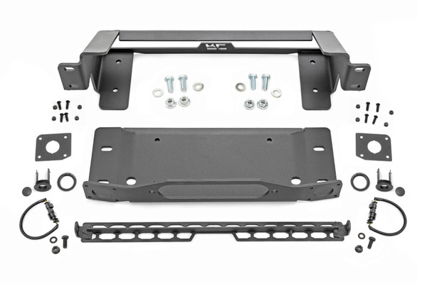 Superior Looks. Looking to take your off-roading game to the next level? Then you need a High Winch Mount! This bad boy works with factory steel modular bumpers for your Ford Bronco and allows the installation of 9500lb or larger winches - perfect for those who like to live on the wild side. Our High Winch Mount also includes an optional 20-inch light bar so you can see what you're getting into. So whether you're an experienced off-roader or just looking to take your adventures to new heights, the High Winch Mount is a must-have!\
Heavy Duty Construction.ΓÇ»This mount is engineered for heavy-duty use, with a 1/4" thick mild steel winch tray and mounts. It also includes 1/4" thick spacers to clear factory tow hooks to install your winch above the factory steel modular bumper. The Bronco High Winch Mount also keeps your adaptive cruise control system in working order, so you can enjoy all the benefits of off-roading without sacrificing safety or style. With this mount, you'll be able to take on any terrain with confidence!\
Installation and Warranty. Rough Country's High Winch Mount includes installation instructions and necessary hardware. In addition, this product is backed with a limited lifetime replacement warranty for manufacturer defects. As such, the product is protected from structural and workmanship damage after the date of purchase. With our industry-leading warranty, give yourself peace of mind when using Rough Country's products! ΓÇ»