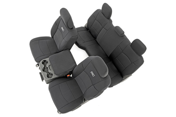 Want to protect your seats or are your seats showing signs of wear and tear from daily use? Say goodbye to unsightly stains and deterioration with Rough Country's Neoprene Seat Covers - the ultimate solution for preserving your vehicle's interior.Snug Fit for Optimal Protection: Our seat covers are tailored to fit your seats perfectly, providing a protective barrier against spills, scratches, and everyday wear and tear.Factory-Spec Construction: Engineered to meet factory specifications, our covers blend seamlessly with your vehicle's interior, giving it a fresh, new look without compromising on quality or style.Four-Layer Defense: With a four-layer construction featuring foam padding and a durable polyester shell, our seat covers offer unmatched protection and longevity, ensuring your seats stay looking new for years to come.Breathable and Water-Resistant: The neoprene layer not only provides breathability for added comfort but also boasts water-resistant properties, safeguarding your seats from spills and stains.Complete Coverage: Our covers come with full protection for your front seats, including headrest covers where applicable, as well as rear covers to shield your back seats from children and pet-related mishaps.Peace of Mind Warranty: Rest easy knowing your purchase is backed by our two-year warranty, giving you confidence in the durability and reliability of our product.Don't let worn-out seats diminish your driving experience. Upgrade to Neoprene Seat Covers today and enjoy a fresh, stylish interior that's protected against the rigors of daily life on the road.