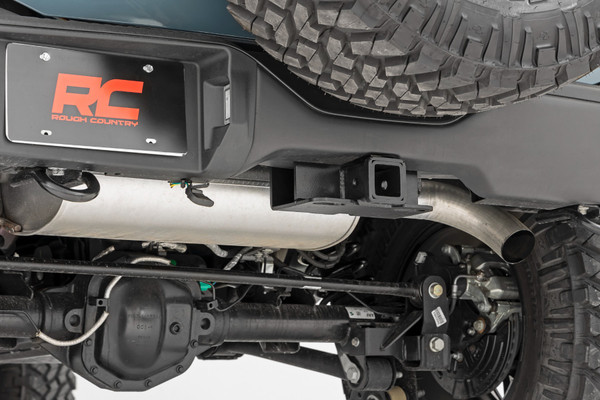 Need to Tow?ΓÇ»If you're looking to add a towing option for your Ford Bronco, the Rough Country Rear Receiver Hitch is a perfect choice. Our Bronco Rear Receiver Hitch is perfect for anyone who wants to tow a trailer or haul some hitch-mounted accessories. It's made from sturdy steel and fits standard ball receivers, so it's perfect for any job. Plus, it's designed specifically for your Bronco, so you know it'll fit like a glove.┬á\
Made to Last.ΓÇ»The Bronco Rear Receiver Hitch is a great choice for your Bronco. It's made from 1/4" steel and has grade 8 hardware, so it's going to be tough and durable. With a gloss black finish, this hitch will look just as good as the rest of your truck.┬á\
Installation.ΓÇ»Our tow hitch comes with everything you need to get the job done and can be installed at home without any drilling or welding. Plus, it bolts right into existing holes, making installation a breeze!┬á\
Warranty. Rough Country's Rear Receiver Hitch is backed with a lifetime replacement warranty towards manufacturer defects. As such, the product is protected from structural and workmanship damage after the date of purchase. With our industry-leading warranty, give yourself peace of mind when using Rough Country's products!ΓÇ»┬á