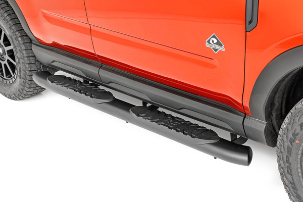 Gain easier access to your cab with the classic, OEM look of Rough CountryΓÇÖs Oval Nerf Step Bars. These durable, steel side steps feature a comfortable, 4.5-inch wide stepping area built into a large, tubular nerf rail that mimics the look of the popular OEM oval step design.\
Each nerf board features a long-lasting black powder coat and durable steel construction that can support up to 500lbs! Each step offers a 30-degree angled end design looks great on any vehicle. A secure, 4.5-inch wide stepping area features a non-slip pad to ensure a confident footing each and every time.