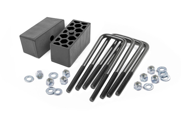 Has the rear of your vehicle started to sag, or are you looking to add a bit of lift height? Whatever the case maybe we have you covered at Rough Country. Upgrade your rear suspension with Rough Country's vehicle-specific block and u-bolt kit!\
Rough Country's rear block and u-bolt kits provide a simple remedy to an age-old problem that simply happens over the span of your vehicle lift. Each kit offers two rear blocks that are tapered to reduce driveline angles, and are much stronger than the standard cast block option. These heavy-duty replacements feature a single pin measuring in a 9/16-inch to snuggle fit into your factory axle pad. Also included is a set of e-coated corrosion-resistant steel u-bolts. Our u-bolts offer four inches of thread ensuring that you have plenty of length to securely install this kit to the rear of your vehicle in no time flat. \
Best of all, Rough Country's vehicle-specific kits are backed by Rough Country's Satisfaction Guarantee!┬á\
┬á