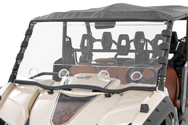 Added Protection and Customizable Comfort: Shield the occupants of your Yamaha Viking from off-road hazards like rocks, branches, and debris with Rough Country's Scratch-Resistant Windshield. This innovative design combines protection with unmatched comfort by featuring 4 adjustable vents that allow you to control airflow to suit your needs. Vents can be closed, opened, or half-opened for ultimate versatility. Whether you're navigating dusty trails or keeping cool on hot days, the 360┬░ rotating vents provide superior flexibility, making every ride more enjoyable. High-Quality Polycarbonate Construction: Crafted from thick .25 polycarbonate material, Rough Country windshields deliver the ultimate combination of clarity, flexibility, and durability. Precision cut for a flawless fit, this material outperforms glass and acrylic in toughness, ensuring your windshield can handle even the roughest terrains. Enhanced Durability with Scratch and UV Resistance: Each windshield is coated with a secondary AR2 hard-coating process, creating a robust scratch-resistant barrier that extends its lifespan. This treatment also provides UV protection, ensuring your windshield remains clear and functional for years to come. Contoured Design with a Precision Fit: The contoured design and premium rubber seal ensure a secure, rattle-free fit that keeps out dust, debris, and water, while seamlessly complementing the rugged aesthetics of your Yamaha Viking.Seamless Roof Compatibility: Engineered to integrate effortlessly with both factory and most aftermarket roofs, this windshield adds versatility without compromising style or functionality. Quick and Easy Installation: With a simple strap-on installation process, you can have your Rough Country windshield ready to go in as little as 15ΓÇô30 minutes. Spend less time prepping and more time conquering the trails. Limited-Lifetime Replacement Warranty: Rough Country stands behind its products with a limited lifetime replacement warranty against manufacturer defects. Ride with confidence knowing your windshield is protected from structural or workmanship damage.