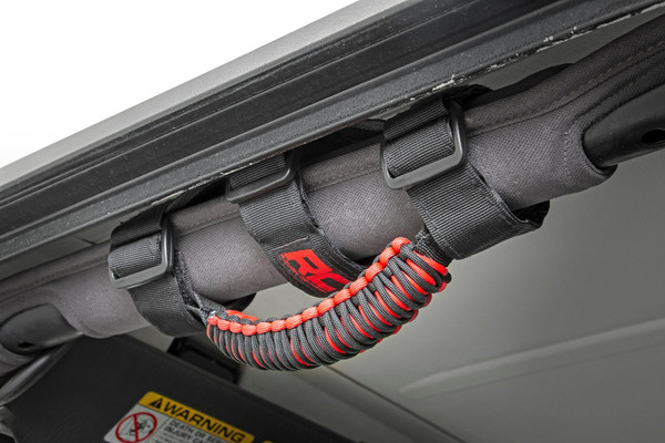 These new handles feature tough nylon webbing, soft foam handle, durable velcro sure grip enclosure and a neoprene cover with the Rough Country Logo.