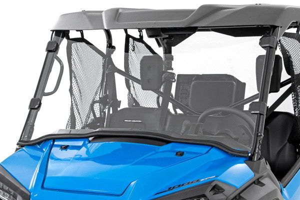 Added Protection and comfortability. Protect the occupants of your Honda Pioneer from off-road hazards such as rocks, branches, and other debris with Rough Country's Scratch-Resistant Windshields. UTV Windshields offer a clear visual of the trail ahead and allow for a much more comfortable outing!\
High-Quality Polycarbonate Construction. Rough Country UTV windshields are constructed from thick polycarbonate material that is precision cut for a perfect fit. ┬áThe polycarbonate material provides an ideal combination of clarity, flexibility, durability that outperforms glass, acrylic, and other windshield materials.┬á\
Durable Scratch and UV Resistance. Each windshield is not only constructed from thick polycarbonate material but enhanced by a secondary AR2 hard-coating process.┬á This process completely coats the windshield with a hardened, scratch-resistant barrier.┬á This treatment also provides the additional benefit of UV protection.\
Easy Installation.┬áWith a simple strap-on installation process, installing a Rough Country windshield couldn't be easier.┬á Within 15 ΓÇô 30 mins you can be ready to hit the trails. ┬á\
Limited-Lifetime Replacement Warranty. Rough Country's Scratch-Resistant Windshields are backed with a limited lifetime replacement warranty towards manufacturer defects. As such, the product is protected from structural and workmanship damage after the date of purchase. With our industry-leading warranty give yourself peace of mind when using Rough Country's Suspension products!