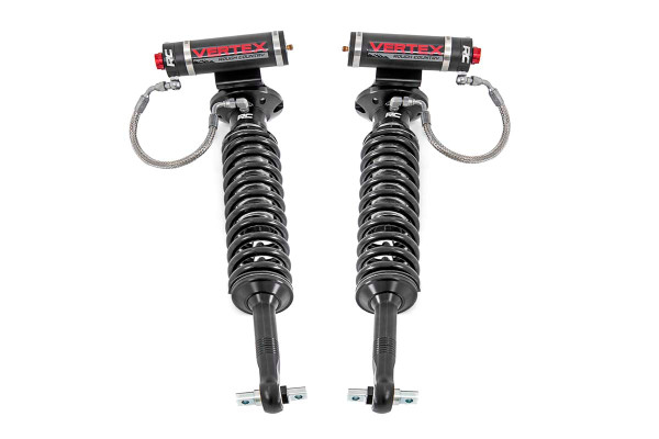 Unrivaled Performance: Unmatched Ride Quality. Experience the pinnacle of off-road control with Rough Country's 2.5 Vertex 8-Stage Adjustable Reservoir Coilovers - precision-engineered to dominate any terrain while delivering a smooth, customizable ride.Dial In Your Ride: With an 8-stage adjustable damping system, you have complete control over your suspension. Whether you're cruising city streets or tackling extreme off-road challenges, a simple turn of the dial fine-tunes your ride for comfort or aggressive performance.Built for the Extreme: Featuring a monotube design with an external remote reservoir, these nitrogen-charged coilovers increase oil capacity and damping sensitivity for superior heat dissipation and fade resistance. A massive 2.5-inch piston and 22mm chrome-hardened piston rod ensure maximum durability and performance in the toughest conditions.Engineered for Durability: A 3-stage seal system prevents dirt, debris, and fluid leakage, while the honed steel body and heat-treated alloy bearing extend longevity. The zinc-plated finish with a double clear coat and unbeatable salt spray resistance (over 400 hours) provide exceptional corrosion protection.Premium Design: These coilovers don't just perform - they turn heads. Featuring CNC-machined billet aluminum accents, a laser-etched RC logo, and premium "Vertex" decals, they combine high-end aesthetics with rugged reliability. They also feature a durable braided steel reservoir line and a laser-etched bracket system, ensuring a sleek, professional finish.Backed by Confidence: Covered by Rough Country's 3-year manufacturer's warranty, these coilovers offer long-term reliability and peace of mind for every adventure.Upgrade your ride today with Rough Country's 2.5 Vertex Coilovers - because performance, durability, and style should never be compromised.